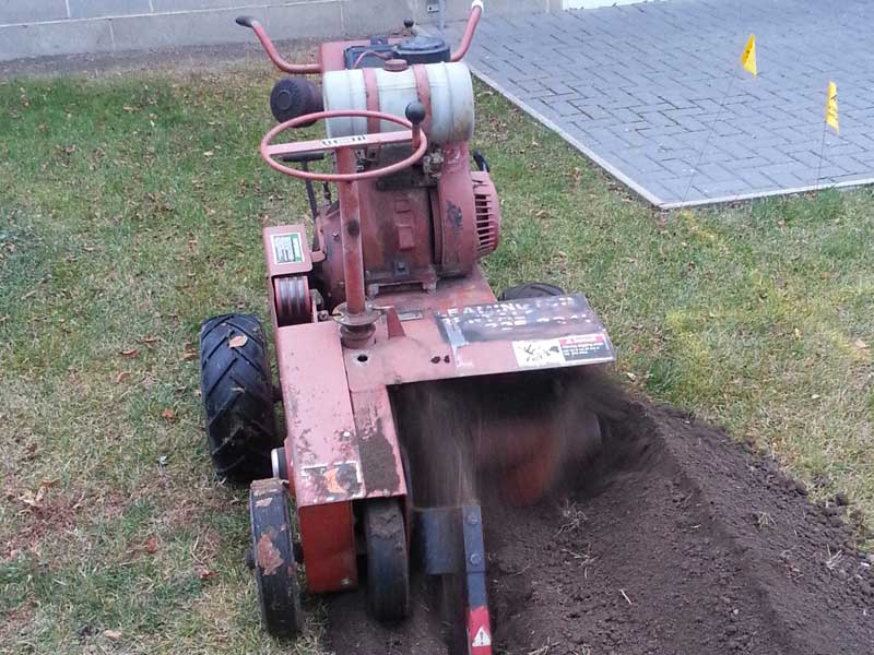 Trencher used for landscaping services
